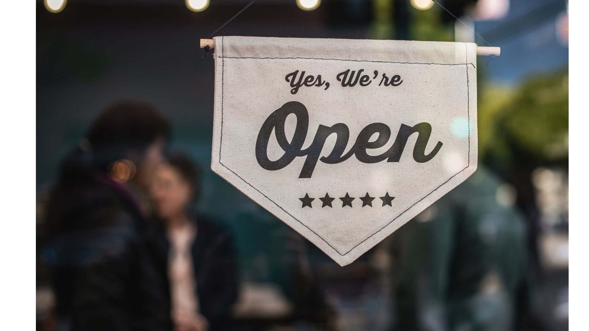 Open banner at the front of a shop